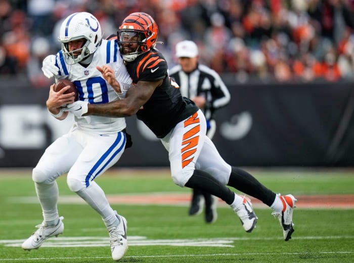 Cincinnati Bengals linebacker Germaine Pratt (57) stops Indianapolis Colts quarterback Gardner Minshew (10) in the 2nd quarter Sunday, December 10, 2023, at Paycor Stadium.